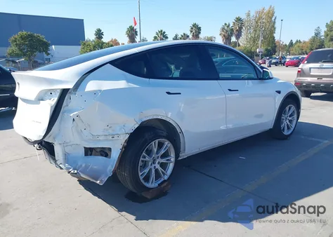 2023 Tesla Model Y Awd/Long Range Dual Motor All-Wheel Drive from USA, damaged, VIN 7SAYGDEEXPF899328